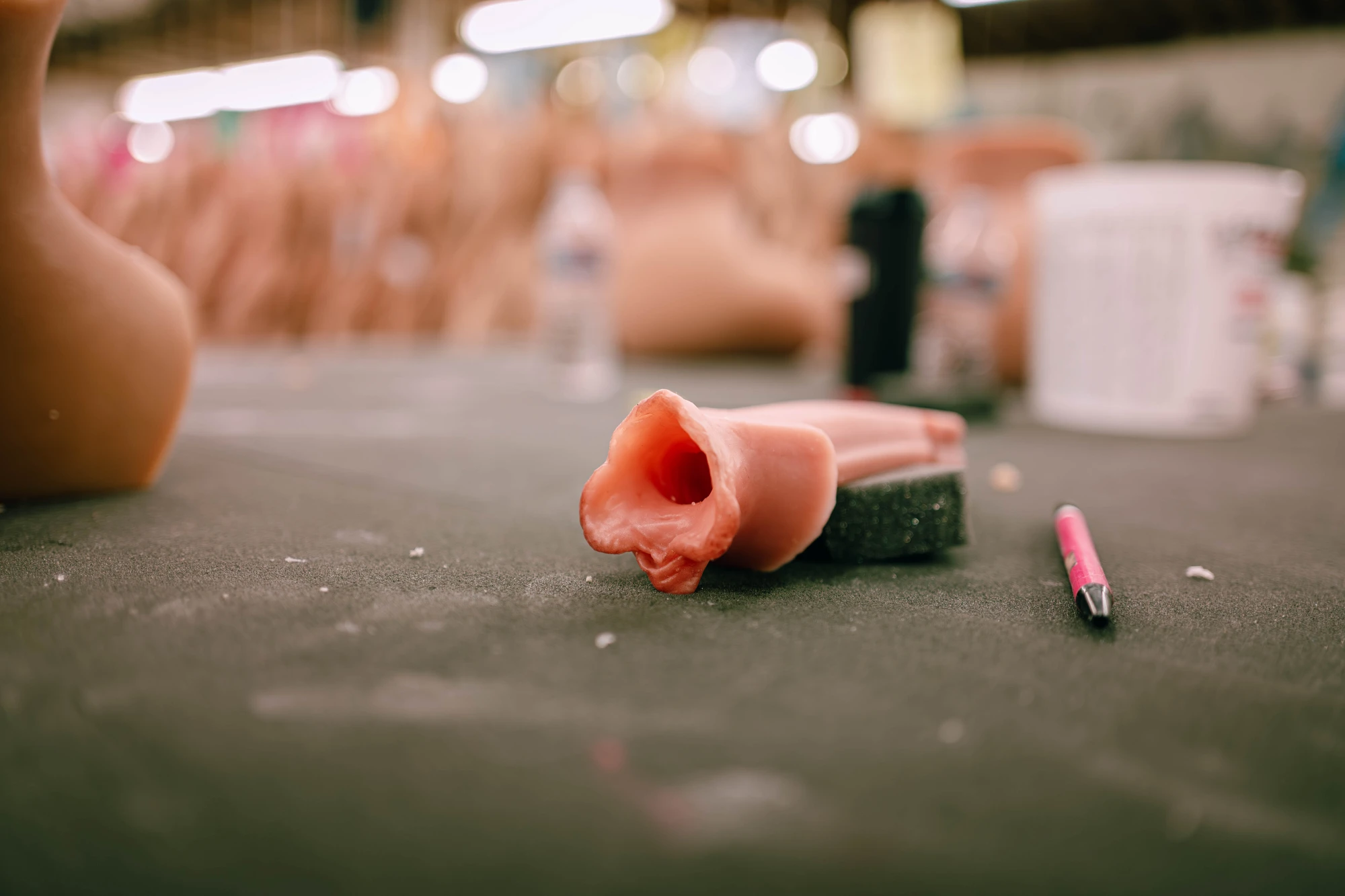 silicone vulva lies on a table.
